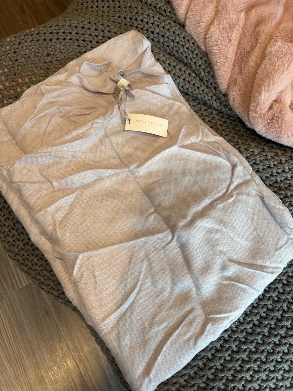 Apricot Lane Light Gray Knit Throw with Gold Accent Tag